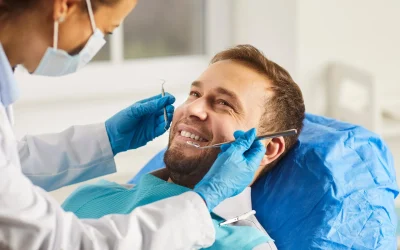 dentist checking patient teeth